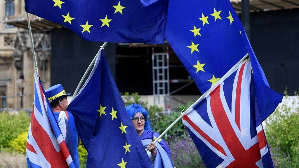 Pro-EU supporters outside the Houses of Parliament in London earlier this month,. Photo : EPA