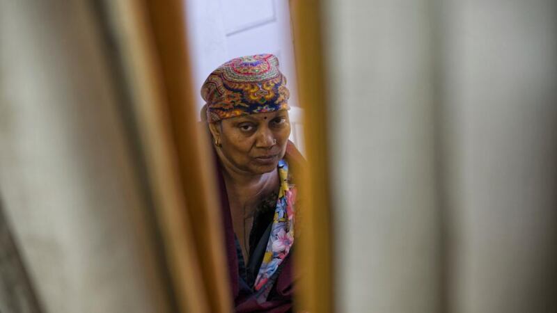 Sarika Jain, a breast cancer patient who has had a mastectomy, waits to be checked by nurses at an outpatient clinic in New Delhi earlier this month. Photograph: Lynsey Addario/New York Times