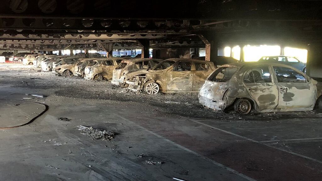 The aftermath of a large fire in the multi-storey parking facility of the Douglas Village Shopping Centre in Cork.