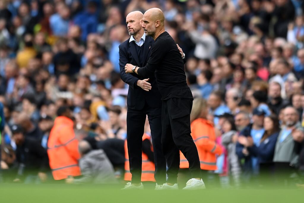 Pep Guardiola, manager of Manchester City, and Erik ten Hag, manager of Manchester United interact after the game. Photograph: Michael Regan/Getty