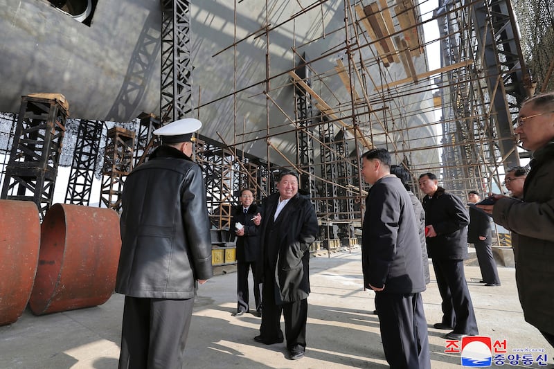 Kim Jong-un inspecting the nuclear-powered submarine under construction. Photograph: Korean Central News Agency/Korea News Service via AP