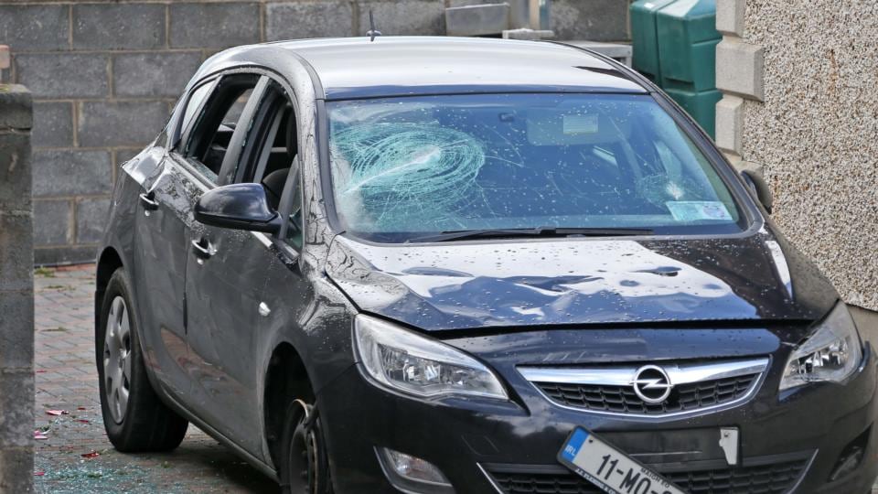 A car in the driveway of the house was also damaged. Photograph: Colin Keegan/Collins Dublin