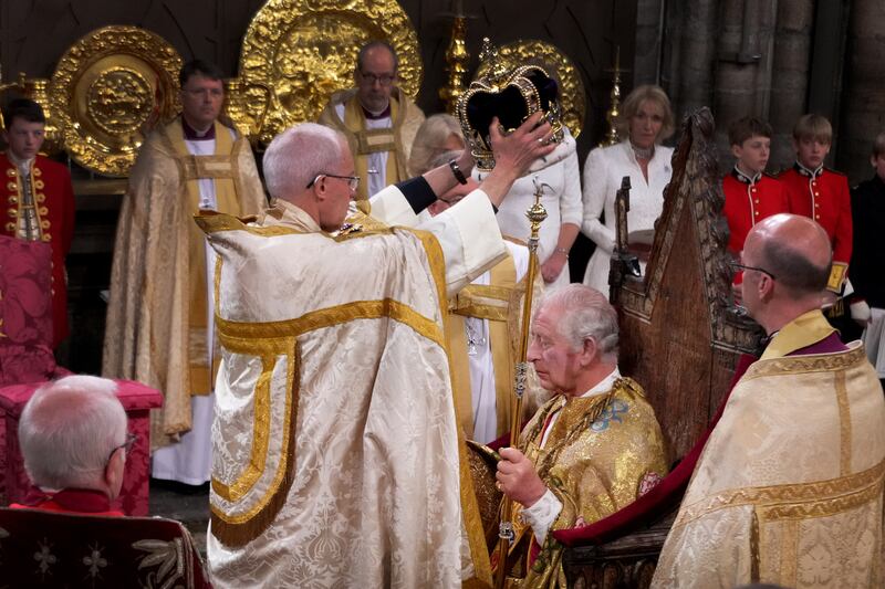King Charles III is crowned with St Edward's Crown by The Archbishop of Canterbury Justin Welby in Westminster Abbey. Photograph: Victoria Jones/WPA Pool/Getty Images