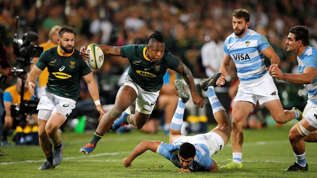 South Africa winger S’busiso Nkosi leaps with the ball before scoring a try during the Test match against Argentina at the Loftus Versfeld Stadium in Pretoria. Photograph: Marco Longari/AFP/Getty Images