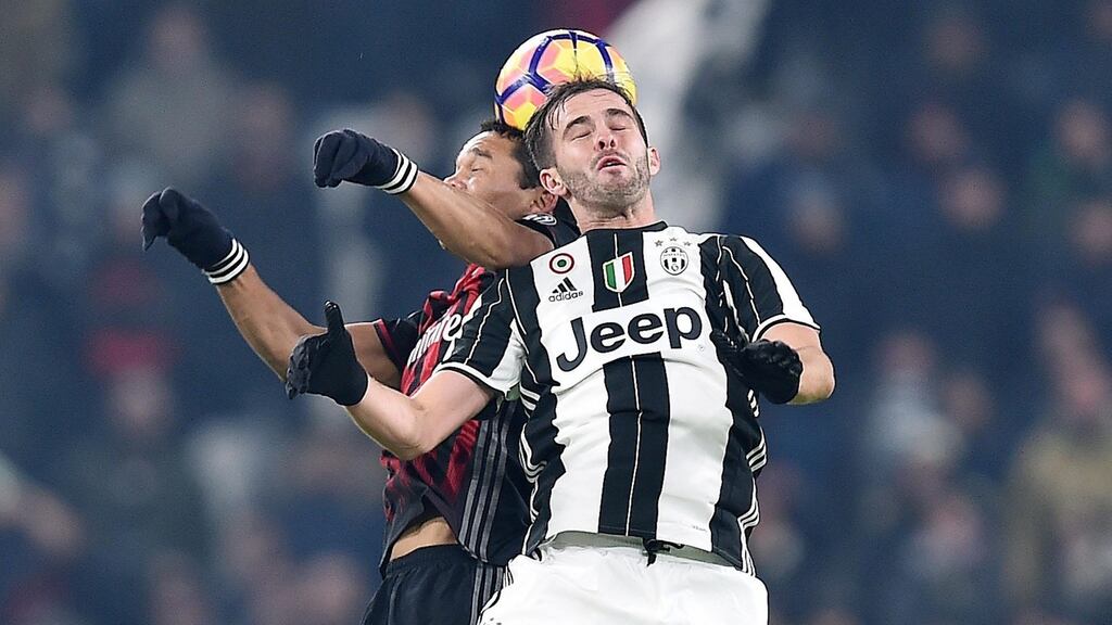 AC Milan’s Carlos Bacca in action against Juventus’s Miralem Pjanic this week. Beijing Guoanin would be more valuable than AC Milan under this deal. Photograph: EPA