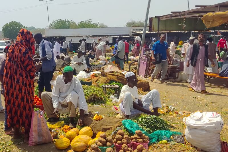People shop at a vegetable market in Gedaref city in eastern Sudan. Photograph: AFP via Getty Images