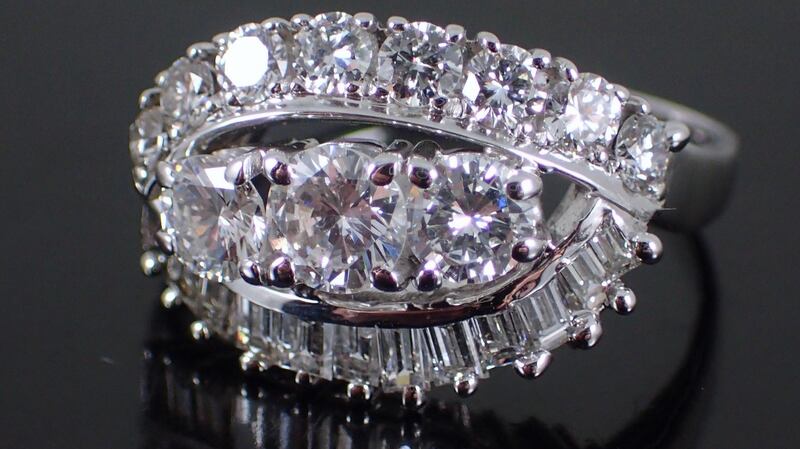Diamond single-stone ring with diamond shoulders at John Weldon