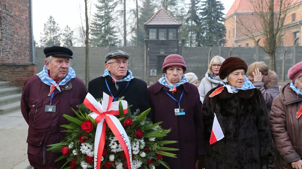 Former prisoners attend a wreath-laying ceremony in front of the Death Wall during ceremonies marking the 75th anniversary of the liberation of the former Nazi concentration camp on Monday. Photograph: Andrzej Grygiel/EPA