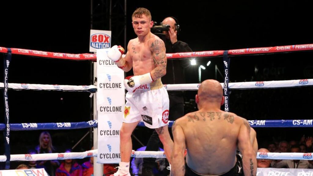 Carl Frampton reacts after knocking down Kiko Martinez during their IBF World Super Bantamweight Championship fight in the Titanic Quarter, Belfast. Photograph: Niall Carson/PA Wire