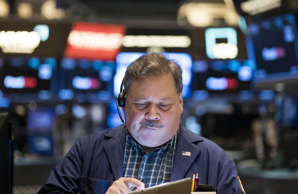 A trader works on the floor of the New York Stock Exchange. Photograph: Justin Lane/EPA