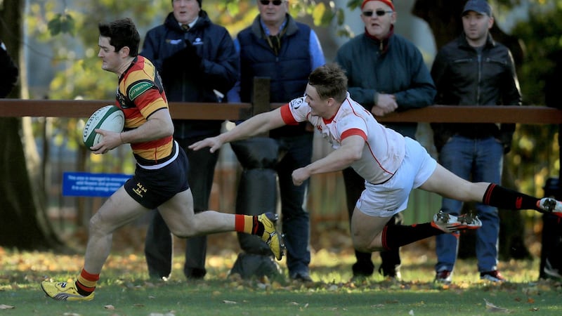 Young Munster take over from Trinity at the top