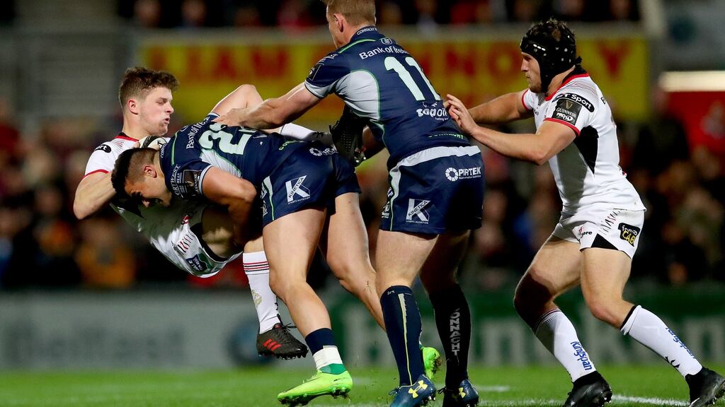 Ulster’s Angus Kernohan is tackled by Cian Kelleher and Matt Healy of Connacht during the clash at the Kingspan Stadium earlier this season. Photograph: James Crombie/Inpho