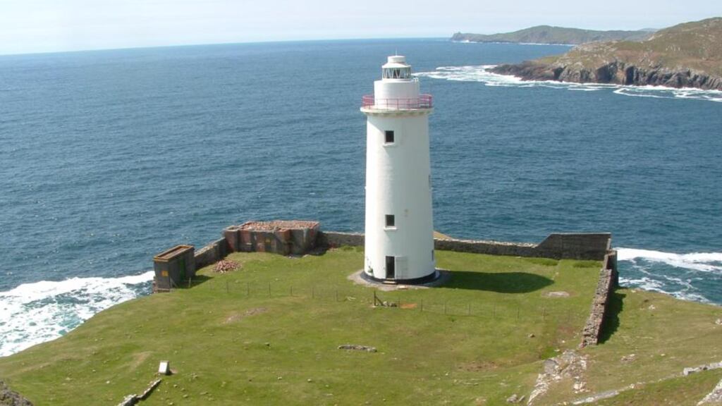 Ardnakinna lighthouse on Bere Island, Co Cork: a report published more than a year ago on boosting island and coastal communities has been “gathering dust”. Photograph: Commissioners of Irish Lights