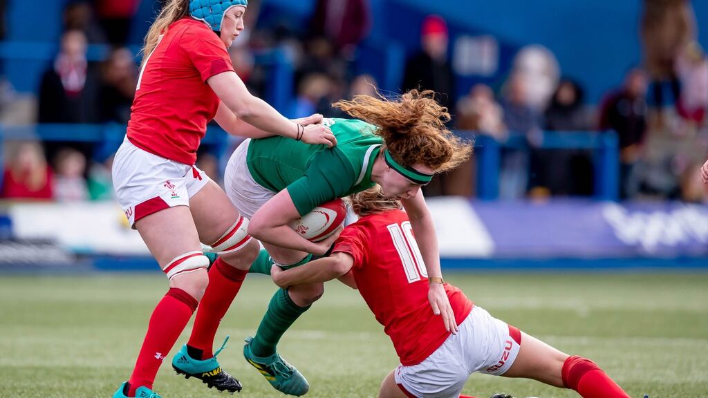 Wales’ Gwen Crabb tand Jess Kavanagh tackle Aoife McDermott of Ireland during the women’s Six Nations match at Cardiff Arms Park. Photo: Morgan Treacy/Inpho