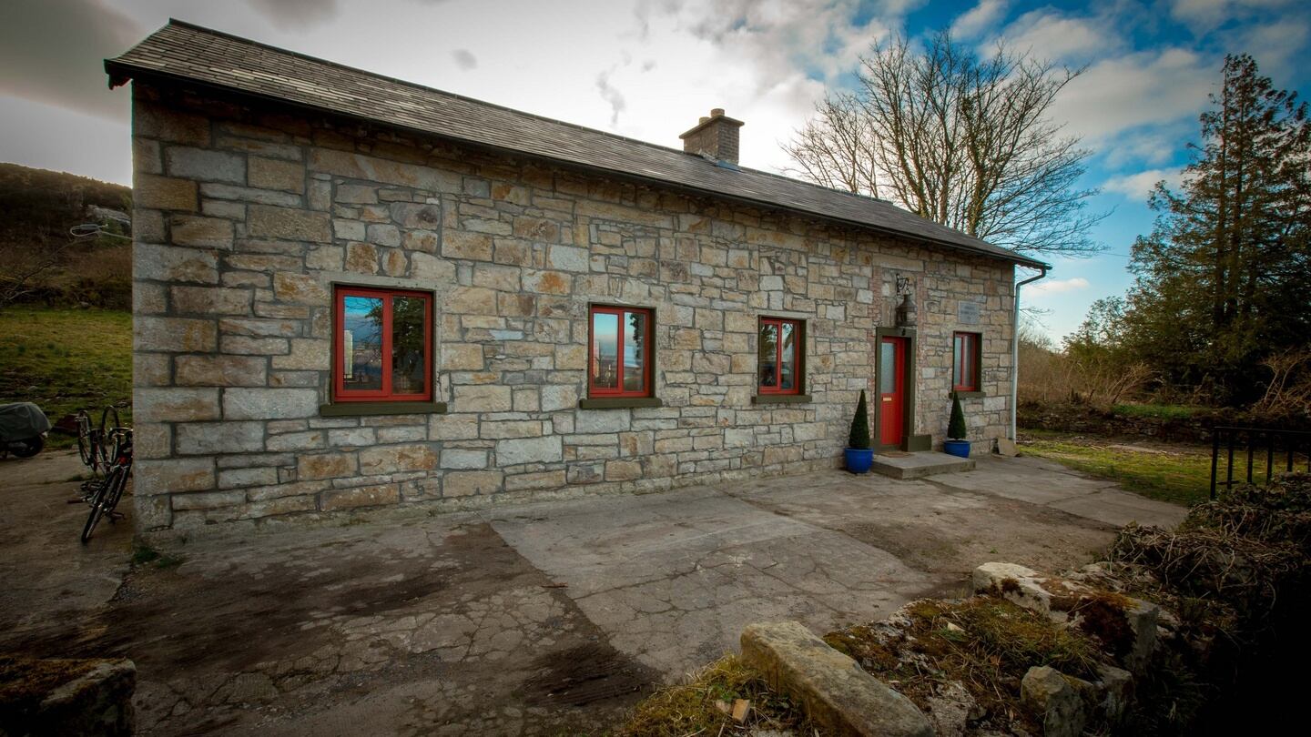 The exterior of the house was rendered white; renovation works uncovered the original stone facade and, inside, the fireplace that was contemporary to Seán Mac Diarmada’s time at the school. Photograph: James Connolly