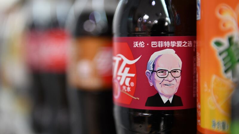 ‘Sage of Omaha’ Warren Buffett is the face of Cherry Coke in China. Photograph: Greg Baker / AFP / Getty Images