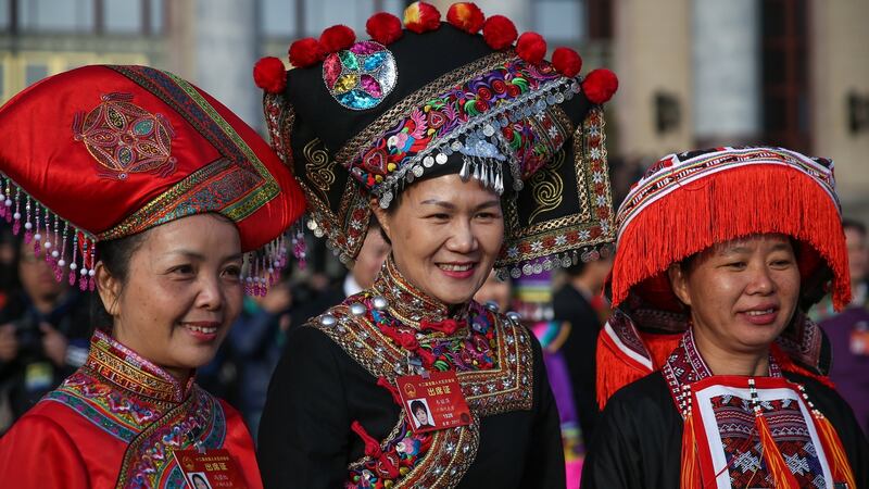Chinese minority delegates wearing traditional costume at the National People’s Congress. Photograph: Roman Pilipey/EPA