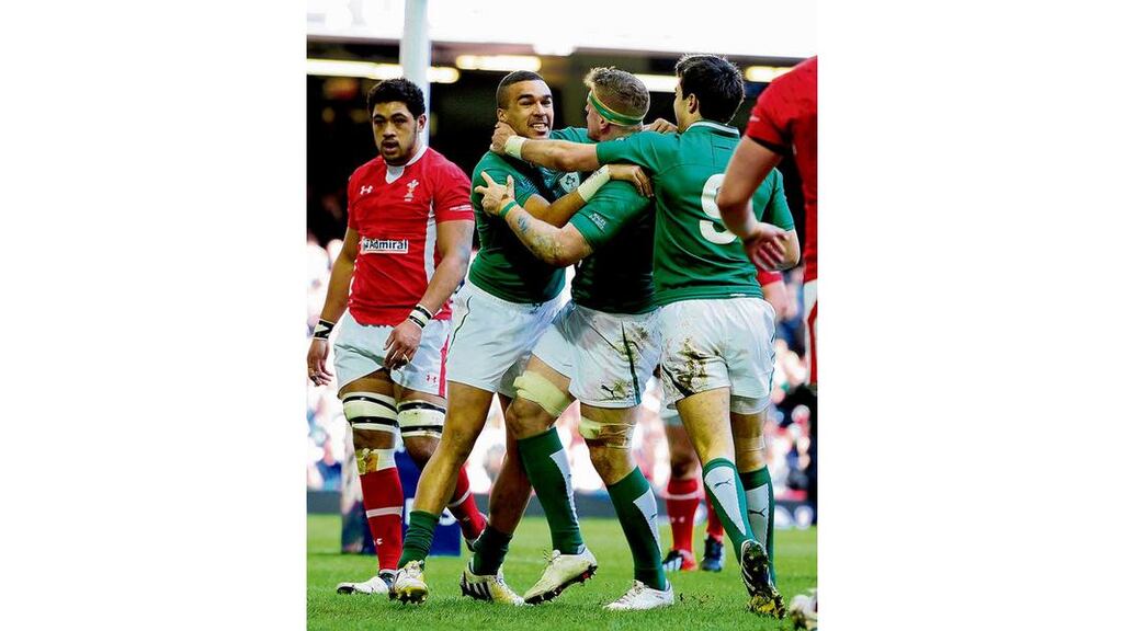 Ireland wing Simon Zebo celebrates after scoring the first try during the Six Nations game between Wales and Ireland at the Millennium Stadium in Cardiff on Saturday. photograph: stu forster/getty images