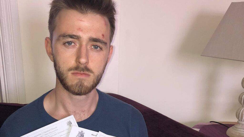 Activist Conor Reddy, who sustained a concussion and neck injuries during his arrest while protesting removal of occupants from North Frederick St