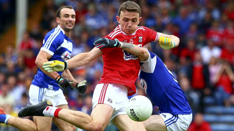 Mark Collins scores his goal in Cork’s rout of Laois. Photograph: Ken Sutton/Inpho