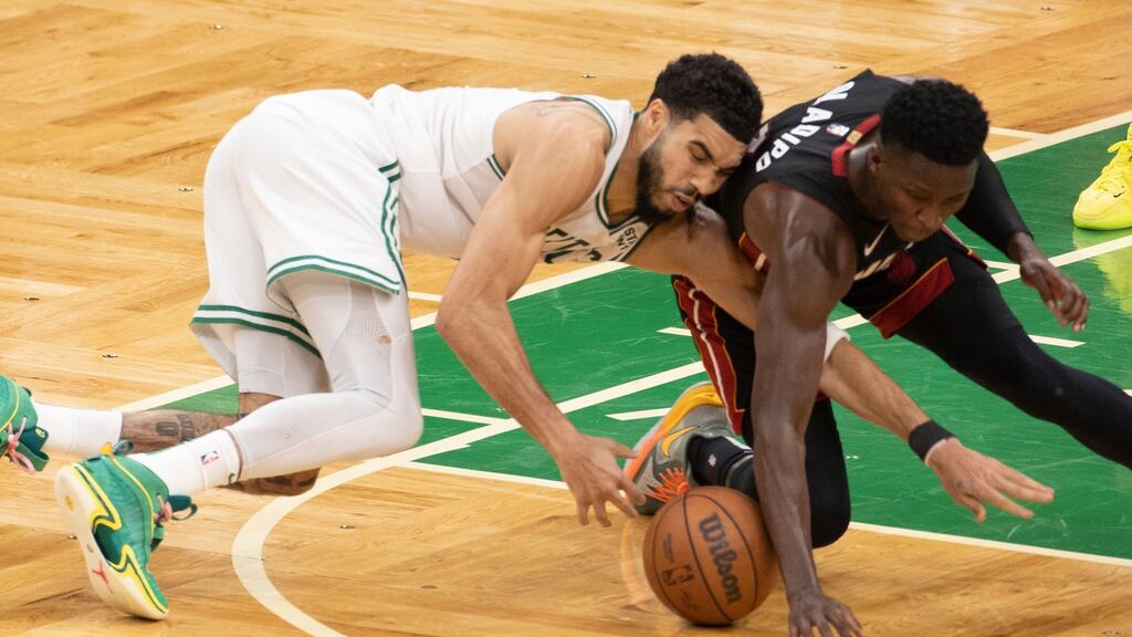 Miami Heat guard Victor Oladipo steals the ball from Boston Celtics forward Jayson Tatum. Photograph: CJ Gunther/EPA