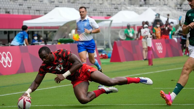 Kenya’s Willy Ambaka scores a try against Ireland. Photo: Shuji Kajiyama/AP Photo