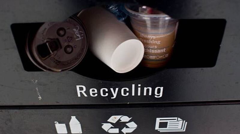 Contaminated recycling bin (above): Vincent Jennings, chief executive of the Convenience Stores and Newsagents Association, told the Oireachtas Committee on Environment that the litter problem was compounded by a lack of facilities for recycling, problems with contaminated waste that cannot be re-used, and weaknesses in enforcement of existing laws. File photograph: Getty Images