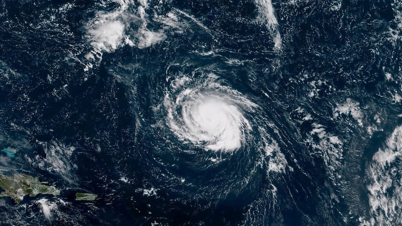 Hurricane Florence seen over the Atlantic Ocean, about 1,207km southeast of Bermuda. Photograph: NOAA NWS National Hurricane Center/Reuters