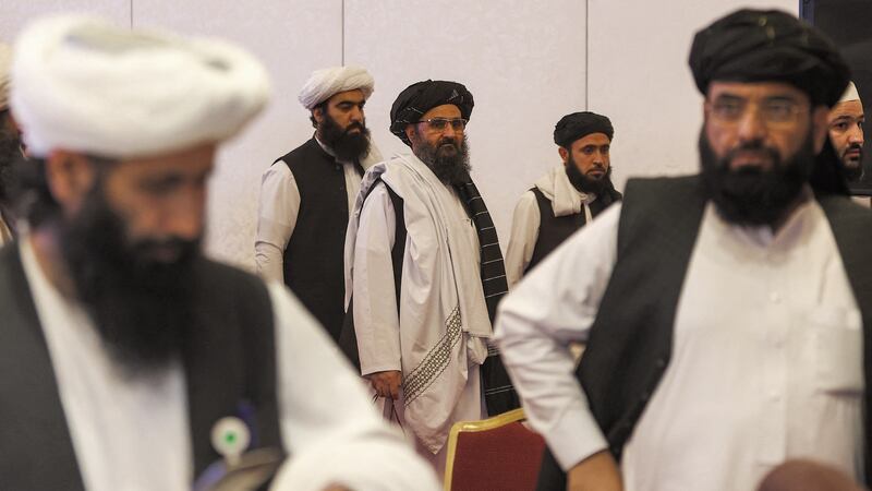 Mullah Abdul Ghani Baradar (centre) after the final declaration of the peace talks between the Afghan government and the Taliban in Qatar’s capital Doha on July 18th. (Photograph: Karim Jaafar/AFP via Getty Images