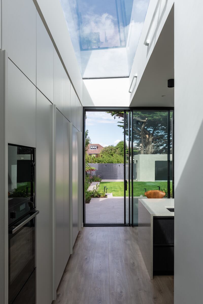 Roof lights and windows in kitchen. Photograph: Ste Murray