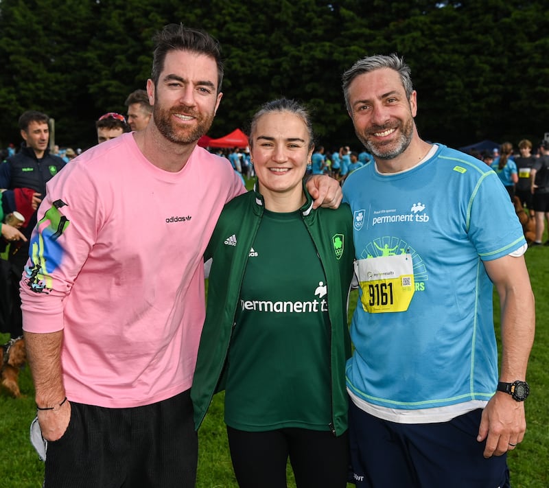 Michael Daragh MacAuley (left) Kellie Harrington and Olympic silver medallist Kenny Egan during the Permanent TSB Sanctuary Run 2023 at the Cross Country track of the Sport Ireland Campus in Dublin. Photograph: Stephen McCarthy/Sportsfile