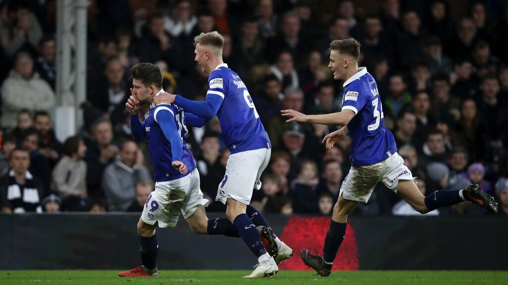 Callum Lang celebrates Oldham Athletic’s winner at Premier League Fulham. Photograph: Julian Finney/Getty
