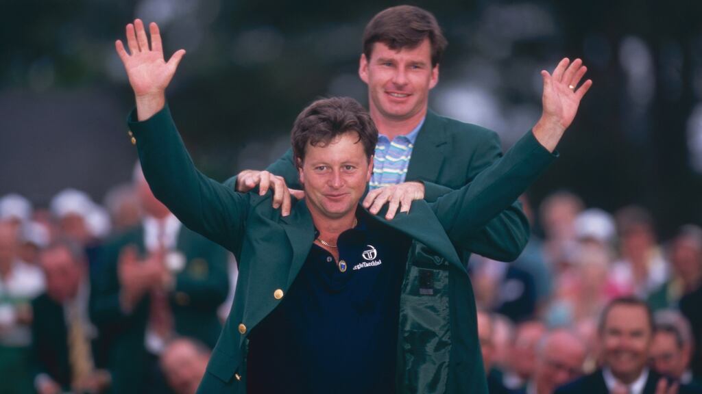 Nick Faldo places the Green Jacket onto Ian Woosnam in 1991. Photograph: Inpho/Getty