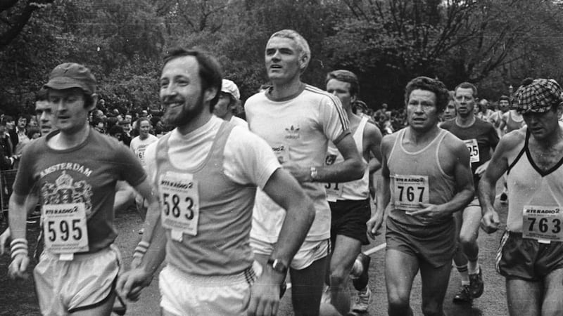 Noel Carroll (centre, white T-shirt) takes part in the inaugural Dublin City Marathon in 1980, which he helped start up. Photograph: Jack McManus/The Irish Times
