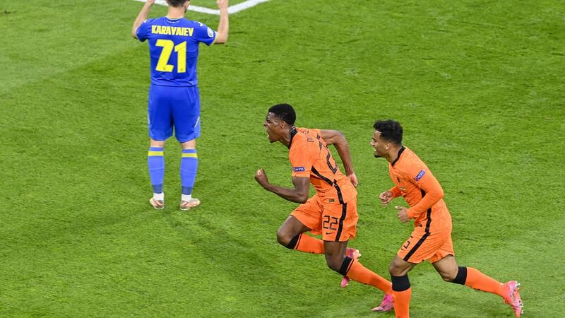 Denzel Dumfries celebrates after scoring the Netherlands’ winner against the Ukraine. Photograph: Olaf Kraak/Getty/AFP