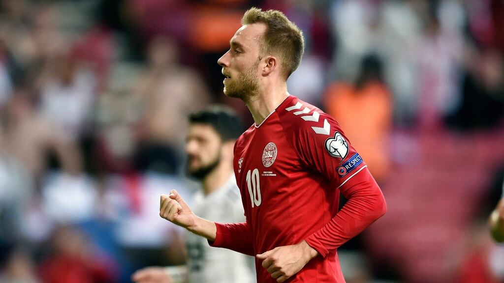 Denmark’s Christian Eriksen celebrates after scoring a penalty. Photo: Liselotte Sabroe/EPA