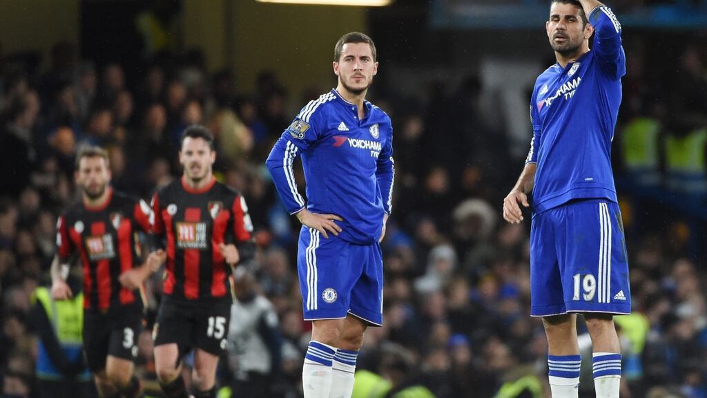 Eden Hazard and Diego Costa stand dejected after Glenn Murray netted the winner for Bournemout. Photo: PA