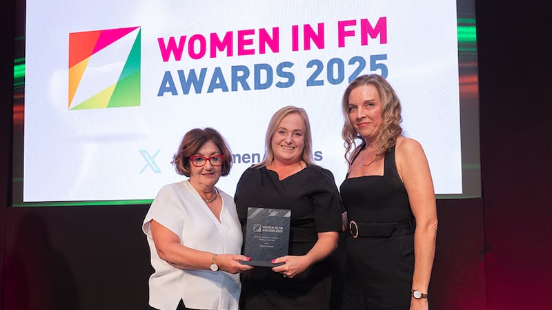 Eileen Slamon, awards judging coordinator, presents the diversity, equality and inclusion strategy of the year award to Aleksandra Krakowiak and Mary Harte, Apleona Ireland