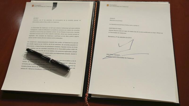 A picture showing the signature of Catalonia’s president Artur Mas on the decree of announcement for the 9th November’s non-binding Catalonian independence referendum at the regional government’s headquarters in Barcelona today. Photograph: EPA