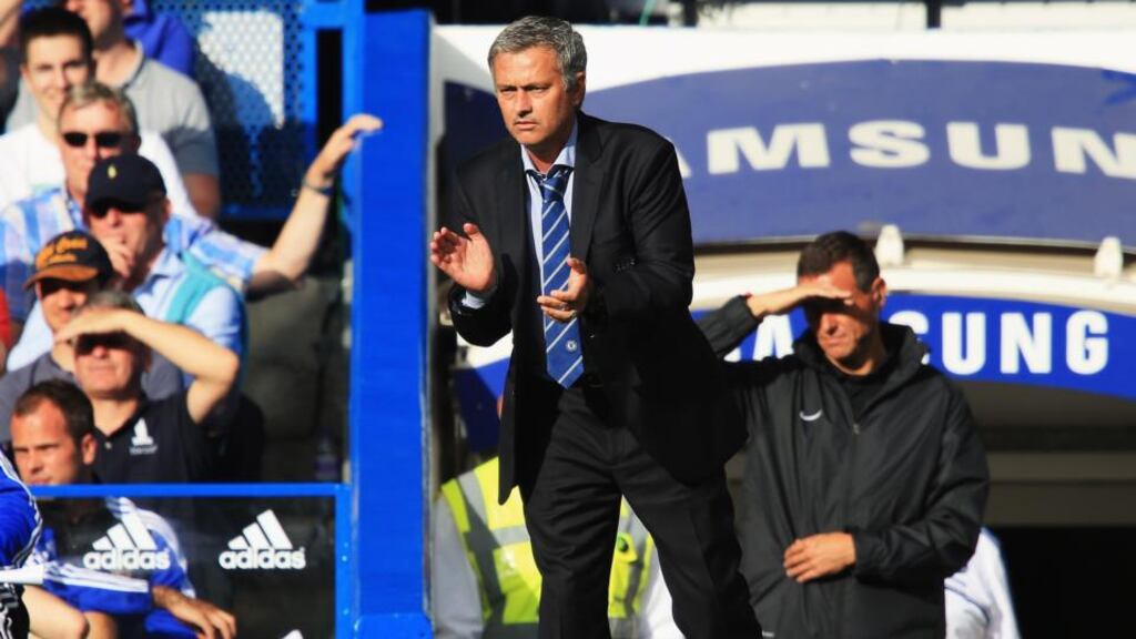 Chelsea manager Jose Mourinho encourages his team during the Barclays Premier League match at Stamford Bridge. Photograph: Richard Heathcote/Getty Images.