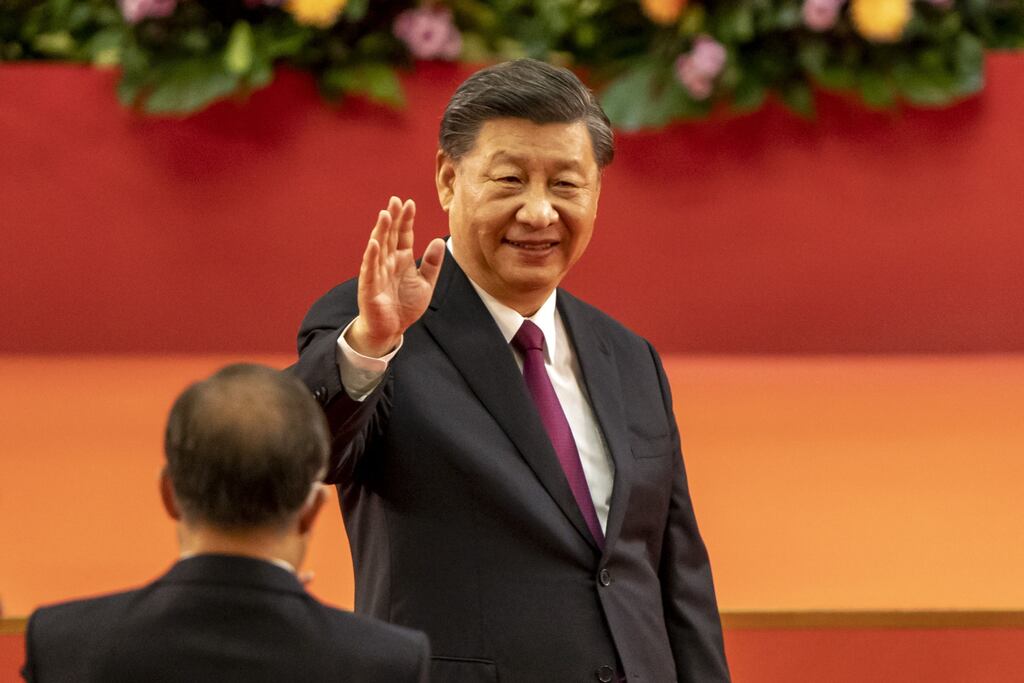 Xi Jinping, China's president, waves after speaking at a swearing-in ceremony for Hong Kong's chief executive John Lee in Hong Kong, China, on Friday. Photograph: Justin Chin/Bloomberg