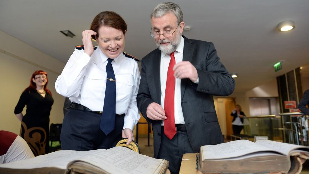 Garda Commissioner Nóirín O’Sullivan and Siptu president Jack O’Connor examine the Dublin Metropolitan Police “prisoners books”. Photograph: Eric Luke/The Irish Times