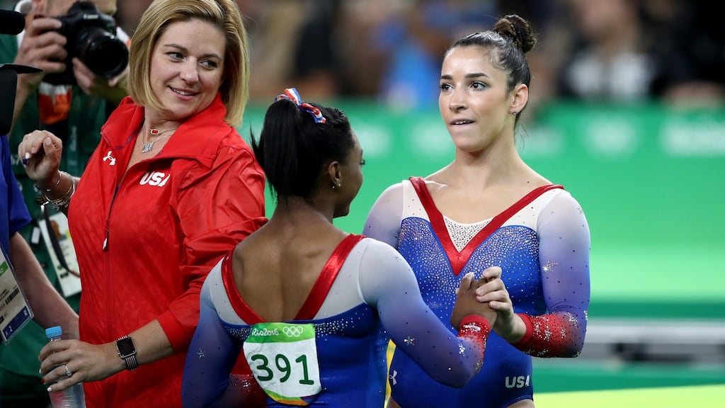 Aly Raisman (R) of the United States is congratulated by Simone Biles (L) after competing on the Women’s Floor final at the 2016 Olympic Games in Rio. Photograph: Julian Finney/Getty Images