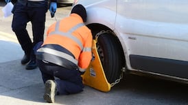 Paid-up parkers still face clamp fee