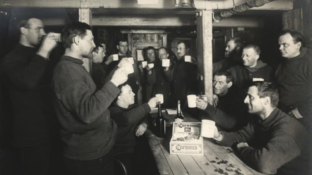 Keeping spirits up: a Saturday evening toast on board the Endurance, during the Imperial Trans-Antarctic Expedition, 1914-1917. Photograph: Frank Hurley/Scott Polar Research Institute, University of Cambridge/Getty Images