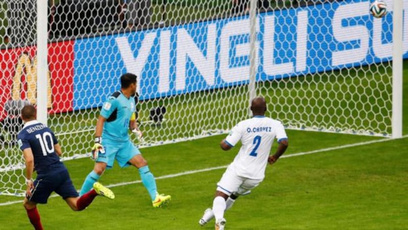 Goalkeeper Noel Valladares of Honduras and teammate Osman Chavez watch as Karim Benzema cannons off the bpost before bieng buindled over the line by the goalkeeper. Photograph: Marko Djurica / Reuters