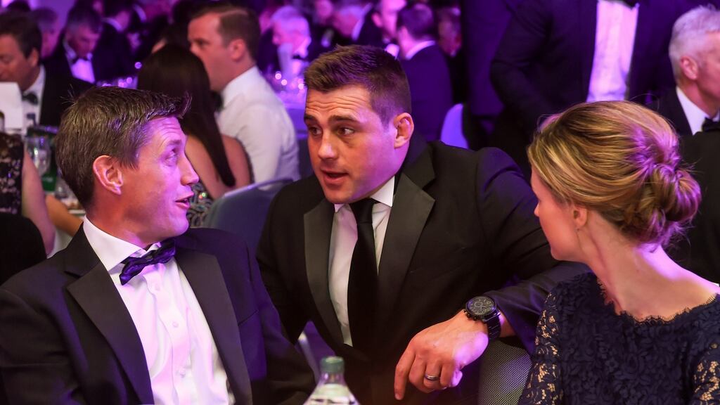 Irupa Hall of Fame winner Ronan O’Gara and his wife Jessica with the Zurich Irupa Players’ Player of the Year CJ Stander at the awards dinner in the Hilton by Double Tree, Ballsbridge. Photograph: Ramsey Cardy/Sportsfile