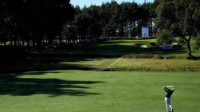 Rory McIlroy plays his second shot on the seventh hole during the third round of the BMW PGA Championship at Wentworth Golf Club. Photograph: Andrew Redington/Getty Images