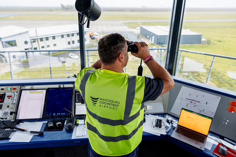 An air traffic controller monitors the aerodrome at the German Aerospace Centre in eastern Germany. Photograph: Jens Sshlueter/AFP via Getty Images