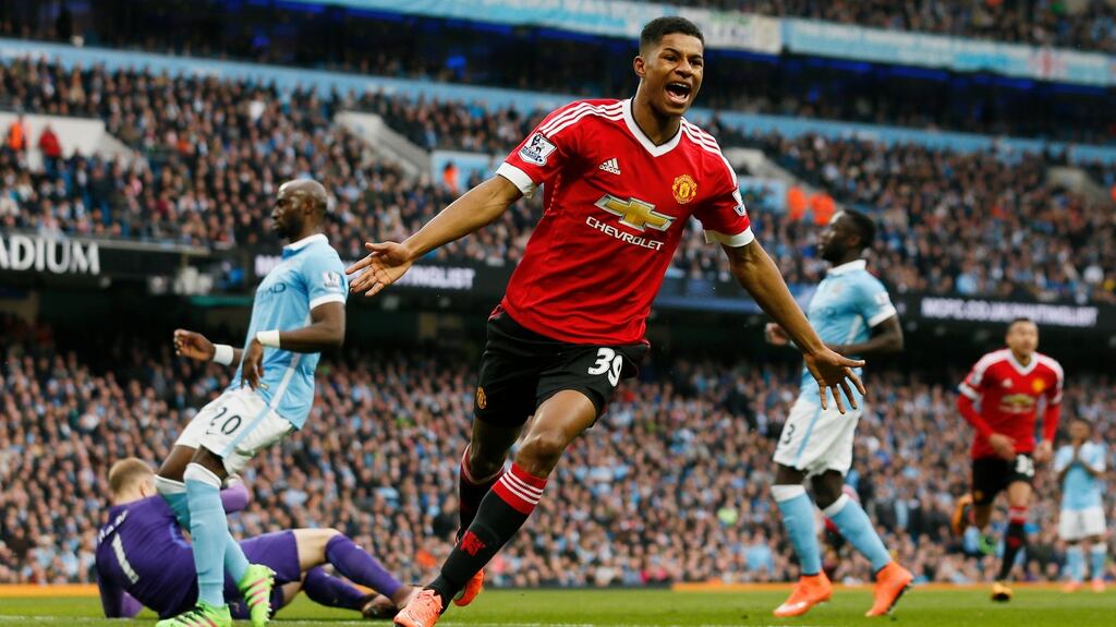 Marcus Rashford celebrates after scoring the first goal for Manchester United in their Premier League clash with Manchester City. Photo: Lee Cairnduff/Reuters
